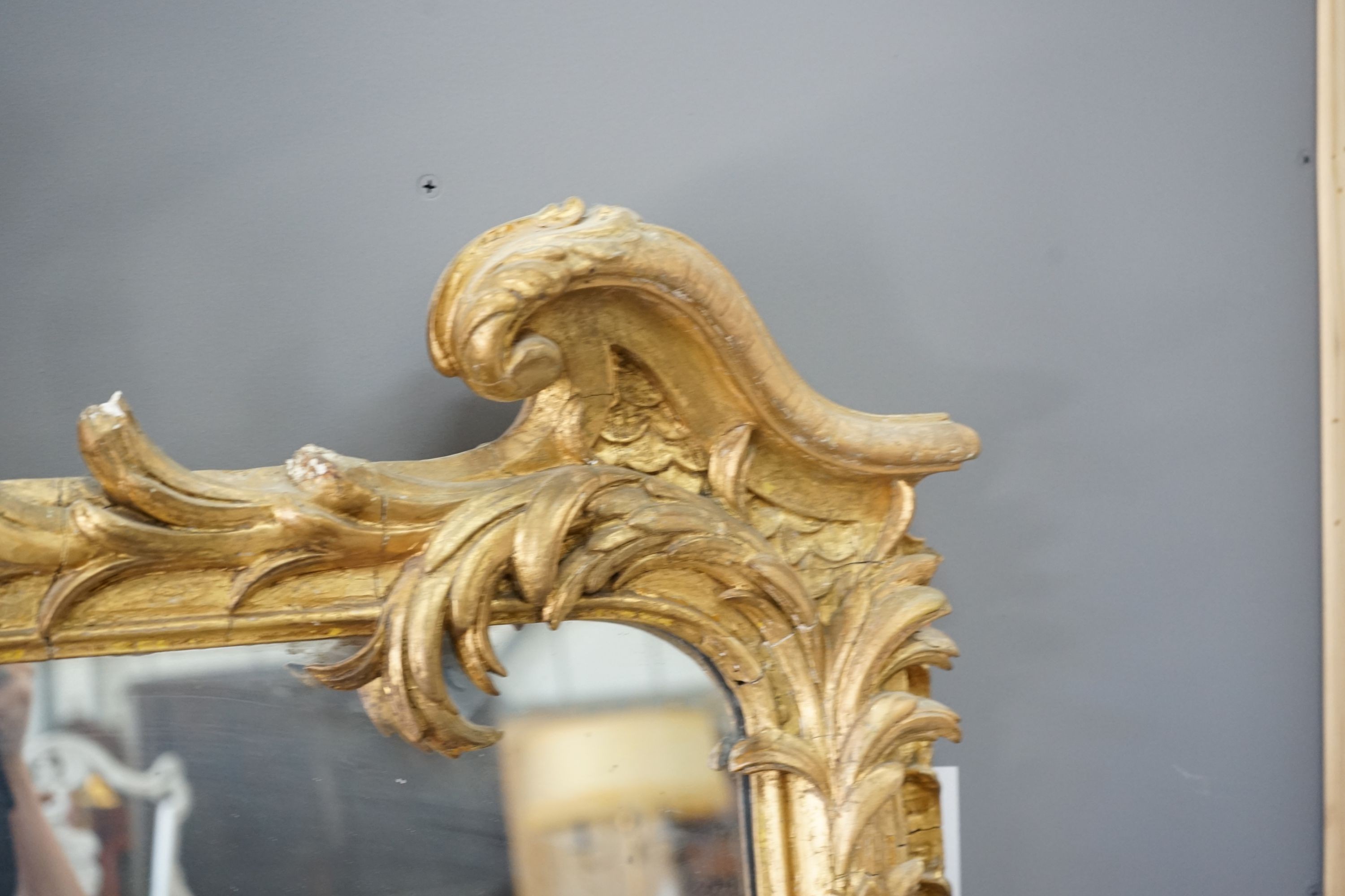 A Victorian giltwood and gesso overmantel mirror, width 130cm, height 168cm